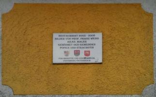 Detail destičky s nápisem na zadní straně Fotografie objektu